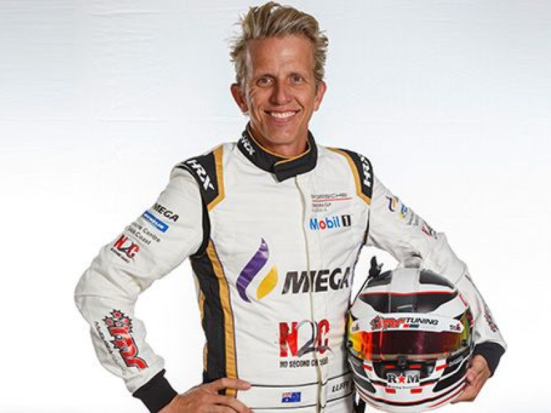 Profile image of Warren Luff wearing his race suit.