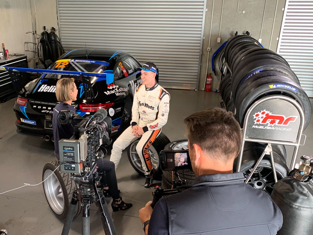 McElrea Racing driver Harri Jones being interviewed at The Bend Motorsport Park 2019