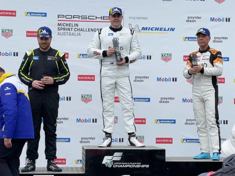 McElrea Racing driver Brett Boulton #84 on the podium at Sandown International Raceway 2022