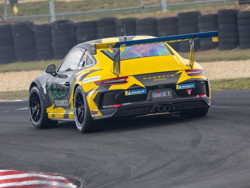Caleb Sumich #14 racing at Symmons Plains Raceway 2023