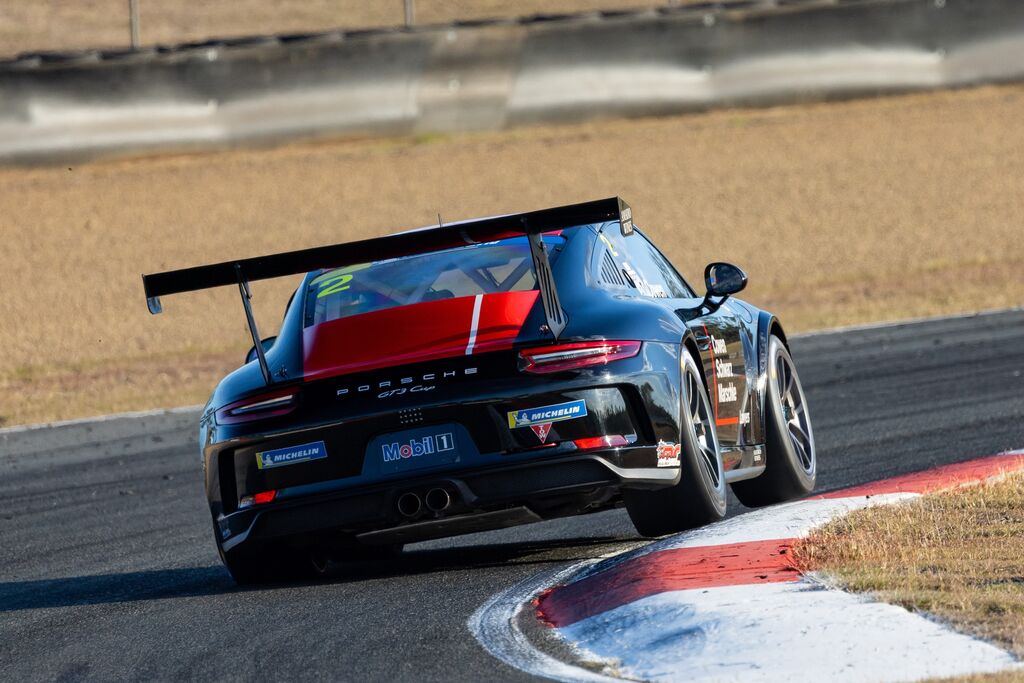 Richard Cowen #2 racing at Queensland Raceway 2023