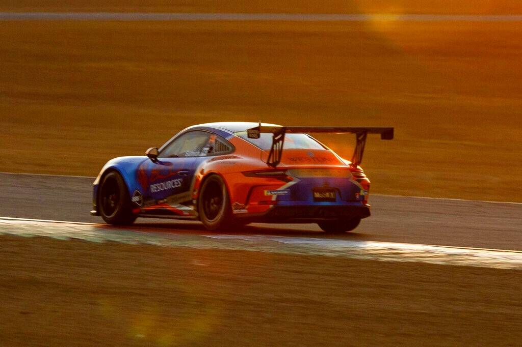 Caleb Sumich #14 racing at Queensland Raceway 2024